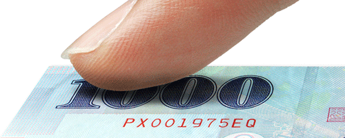 鈔票級凹版印刷在視覺上看似平整，觸摸時具有凸出的觸感